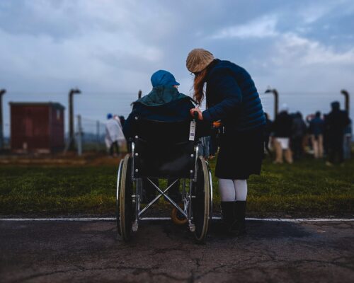 Woman in Wheelchair with Friend