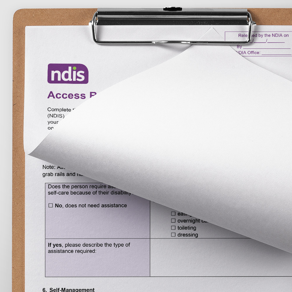 Clipboard with NDIS paperwork on it.